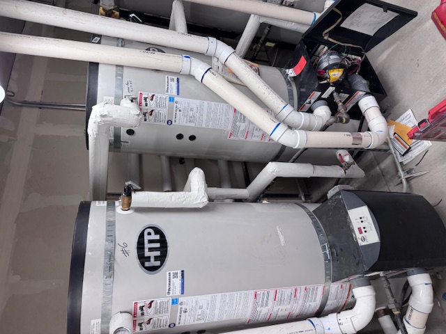 Rush Plumbing water heaters and piping demonstrating the advantages of a Rush Plumbing Maintenance Service Plan