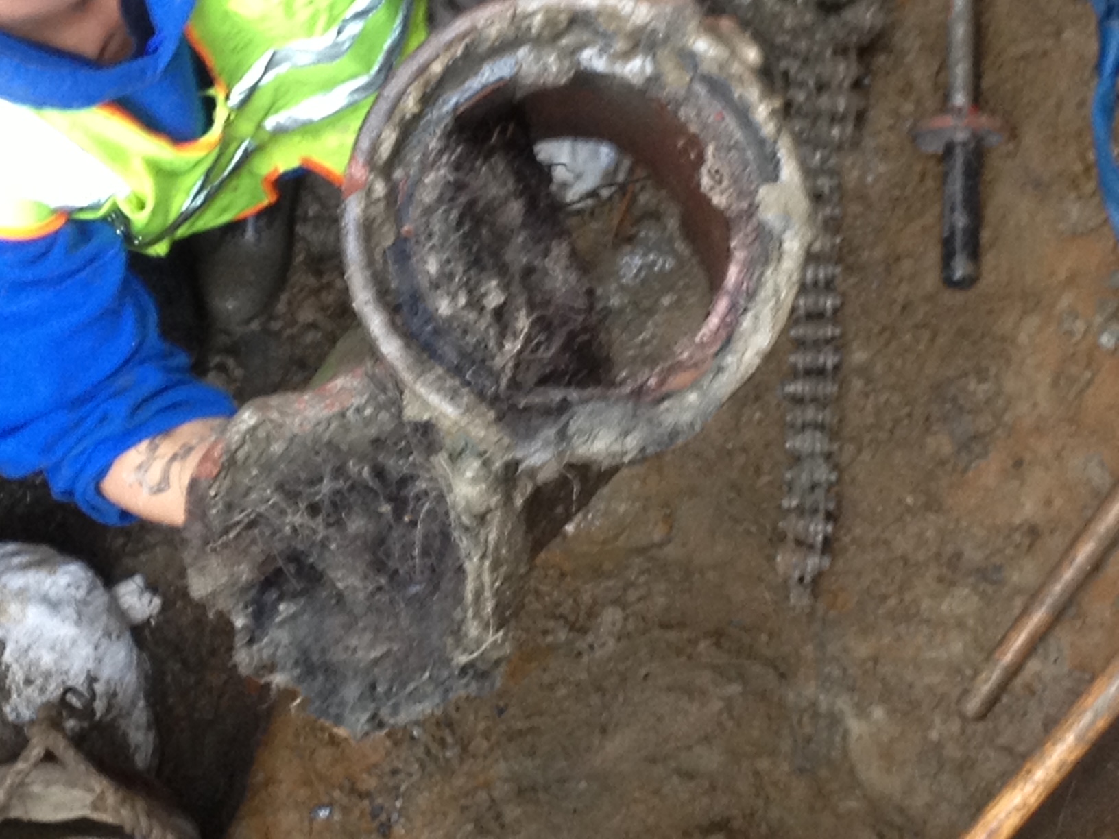 Rush Plumbing worker displaying problme with water main