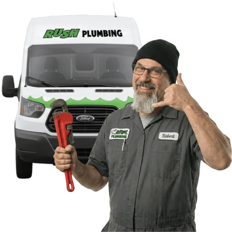 Man smiling with pipe wrench inspiring a phone call to Seattle Plumbing Repair Services